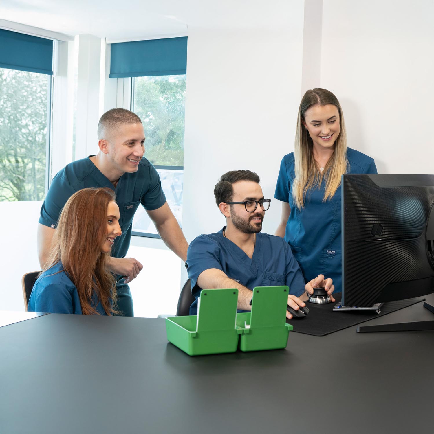 Corporate photography showing a professional team collaborating in a workplace