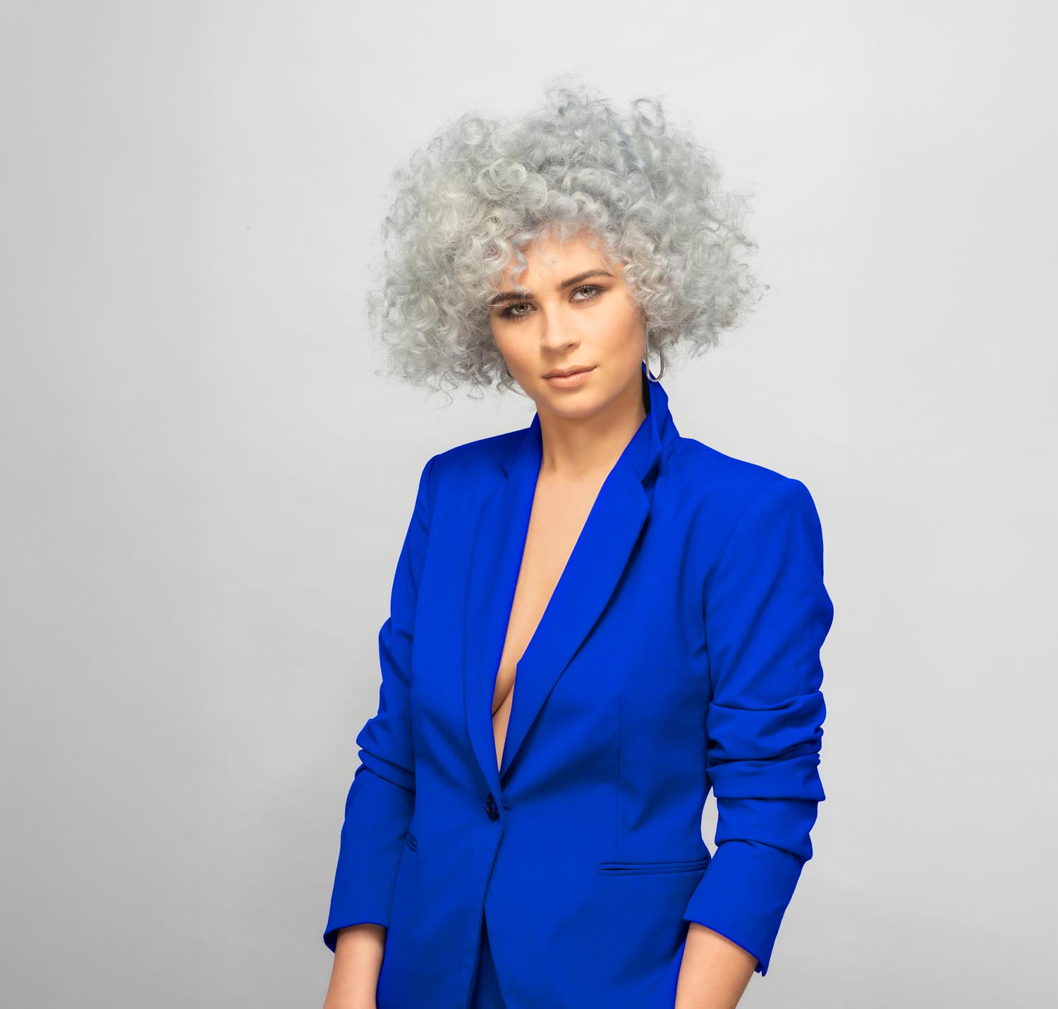 Professional business headshot photographed in a studio